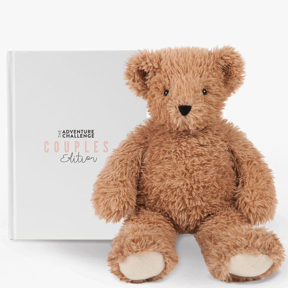 18-inch light brown super soft plush bear with black eyes and nose sitting in front of white box labeled Adventure Challenge .