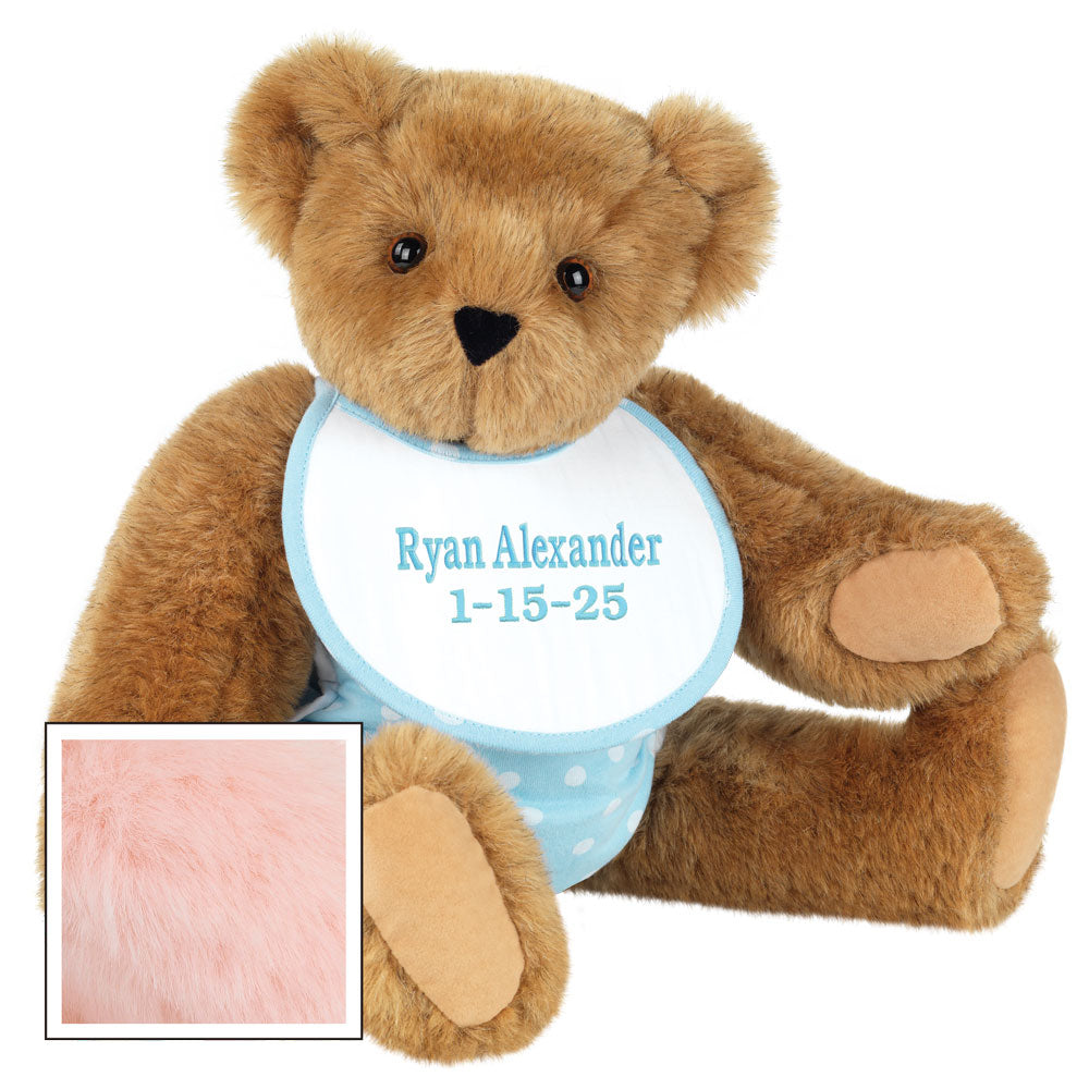 Honey-colored 15-inch teddy bear with brown eyes wearing personalized blue bib with white polka dots and name date embroidery.