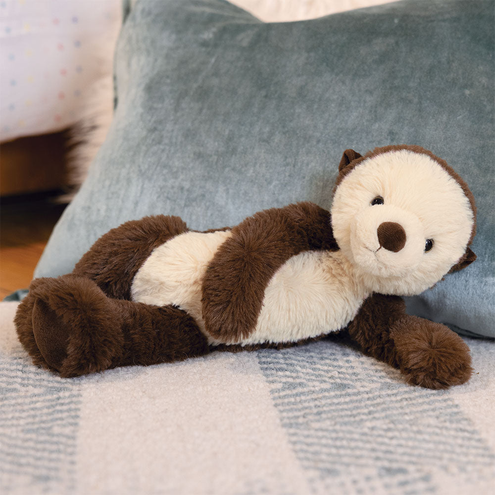 Plush brown and cream otter lying on side with soft fur and embroidered face details.