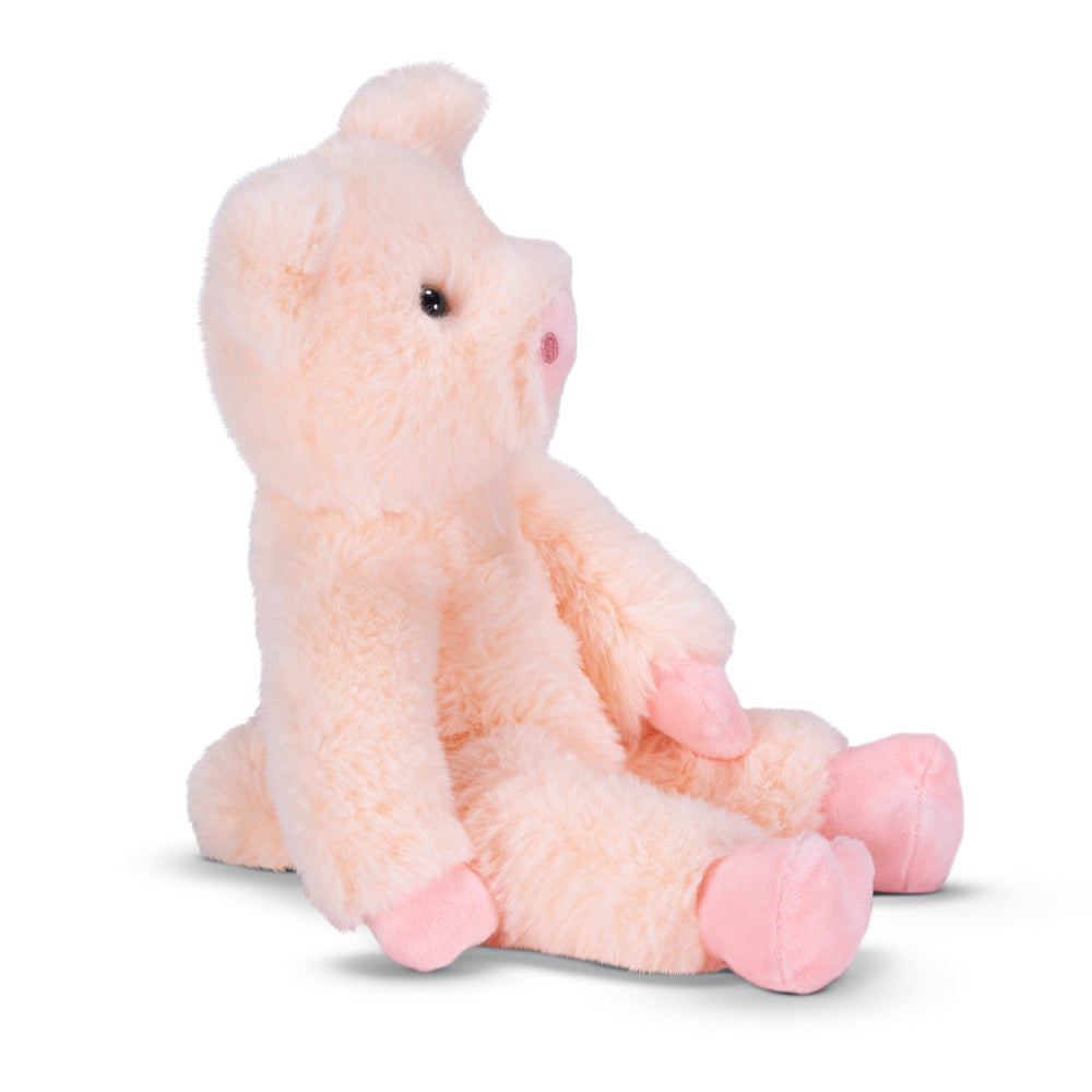 Soft light pink plush pig with darker pink snout, ears, and feet, sitting upright.