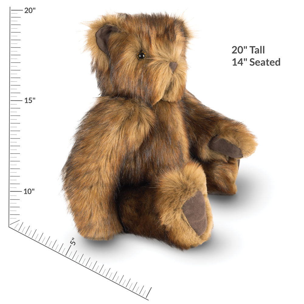 Plush teddy bear with brown and peanut butter colored fur, seated with stitched paws and black eyes, 20-inch tall.