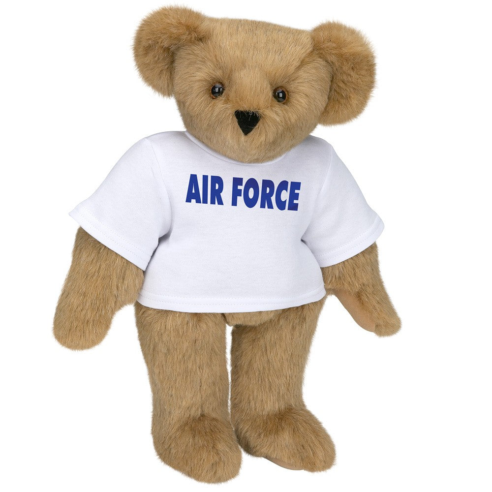 Light brown teddy bear wearing a white "Air Force" t-shirt standing upright.