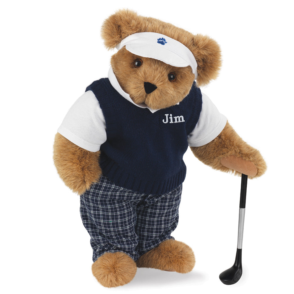 15-inch plush bear dressed as a golfer in navy sweater vest, white shirt, plaid pants, white visor, holding golf club.