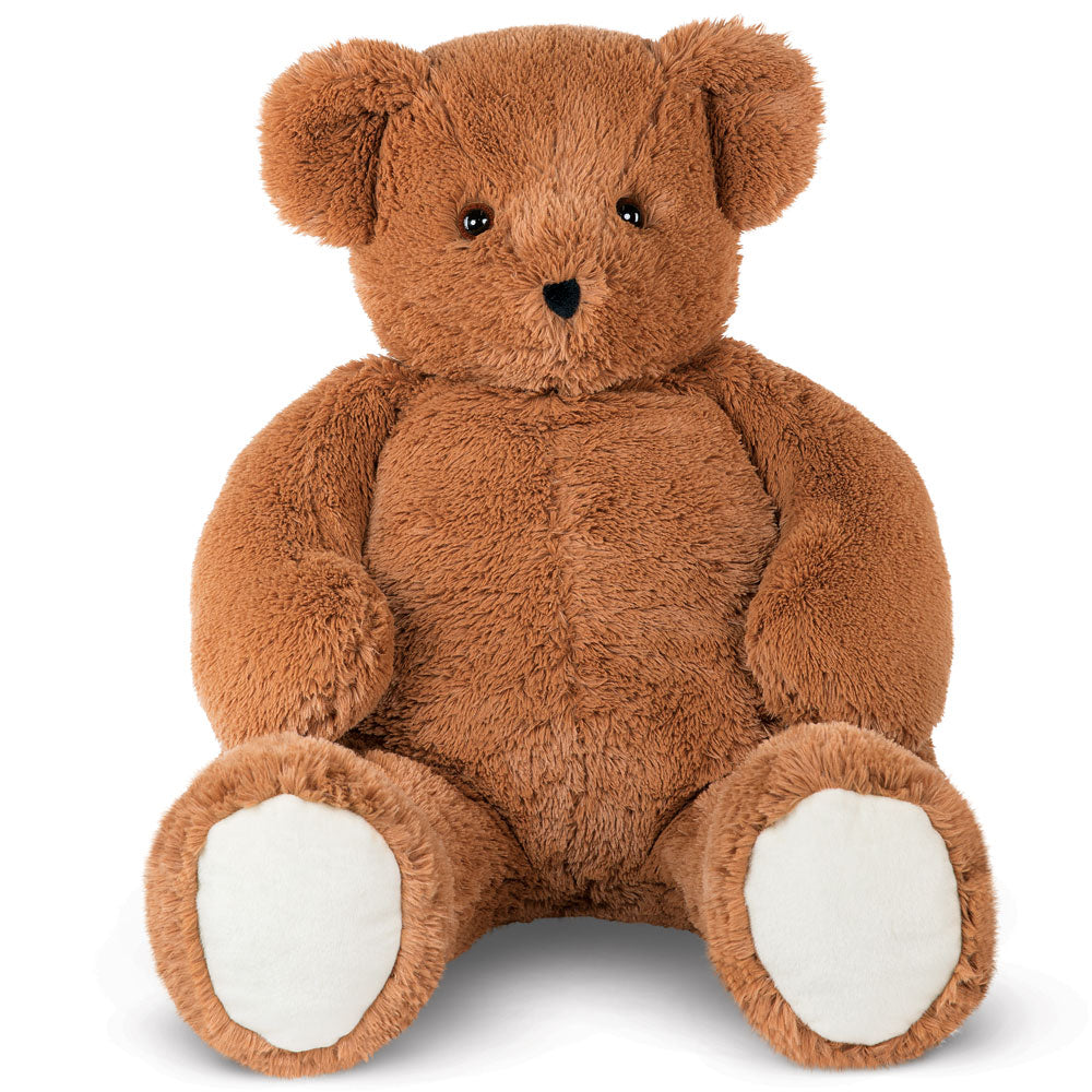 Large 4 ft. brown plush teddy bear with white paw pads and black eyes and nose.