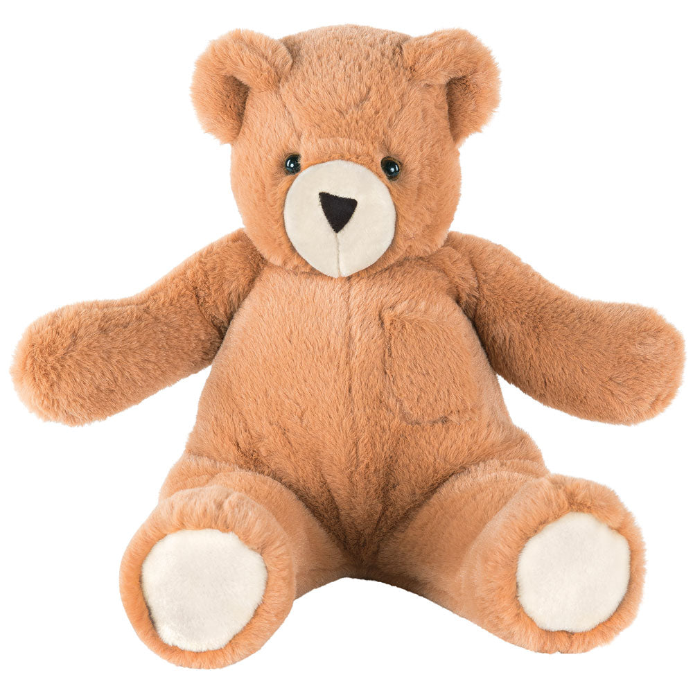 Light brown plush teddy bear with white snout and paw pads, black eyes, and a front pocket.