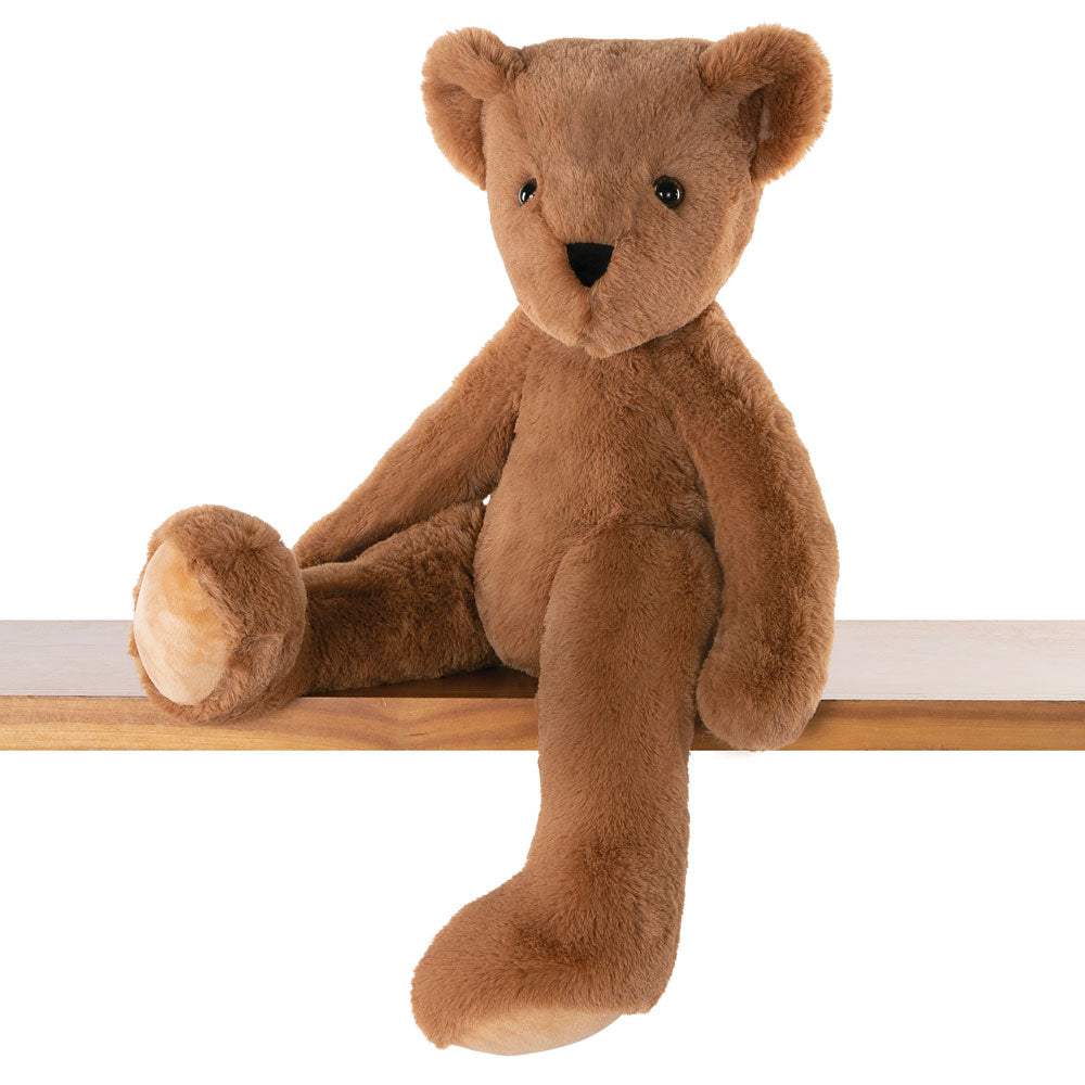 24-inch brown plush teddy bear with black eyes and nose, sitting with one leg extended.