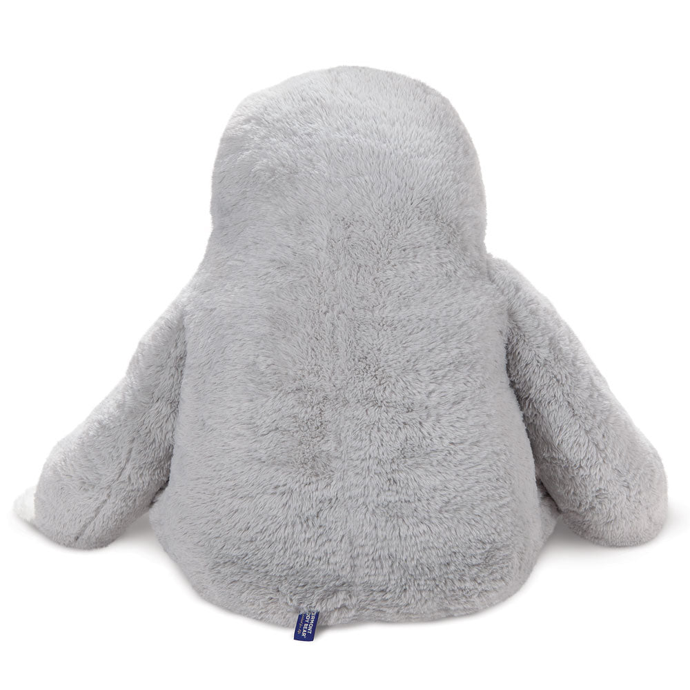 Large plush sloth toy in light gray with long arms and soft fur shown from the back.