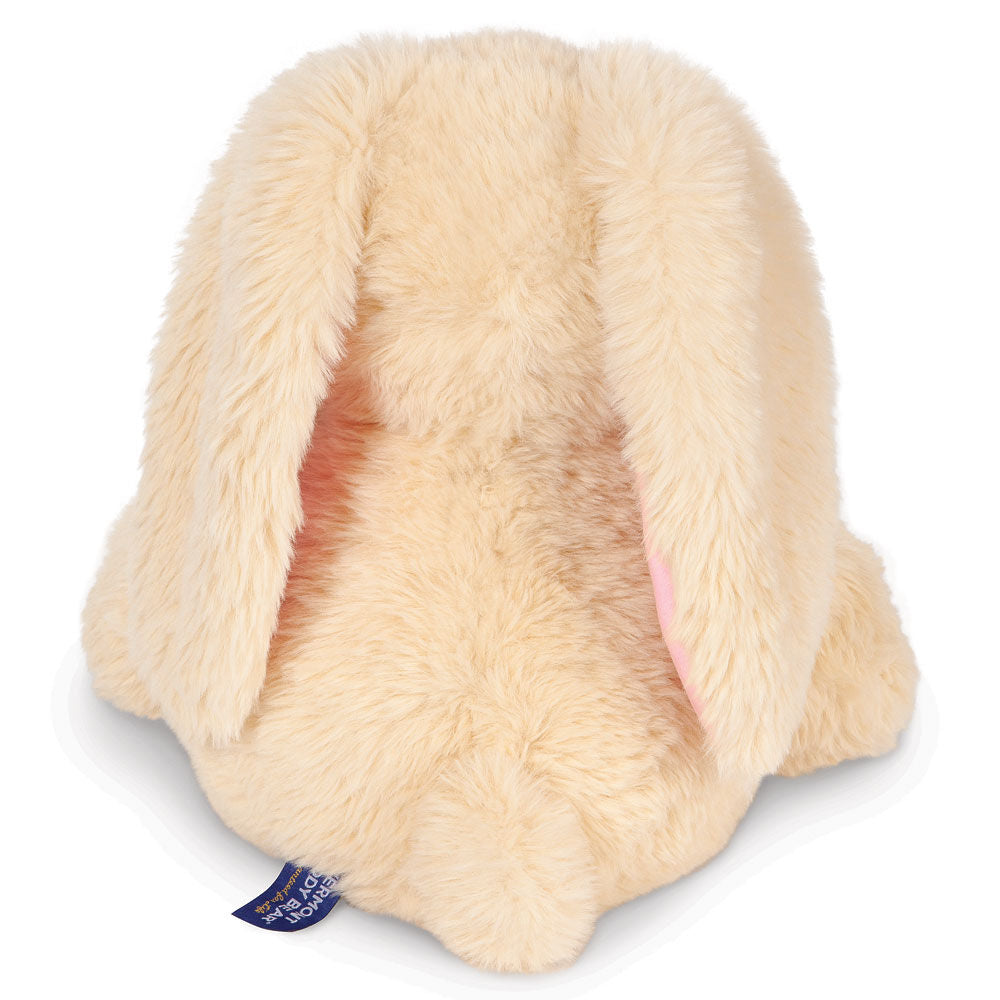 Plush light beige bunny with long floppy ears and soft, fluffy fur.
