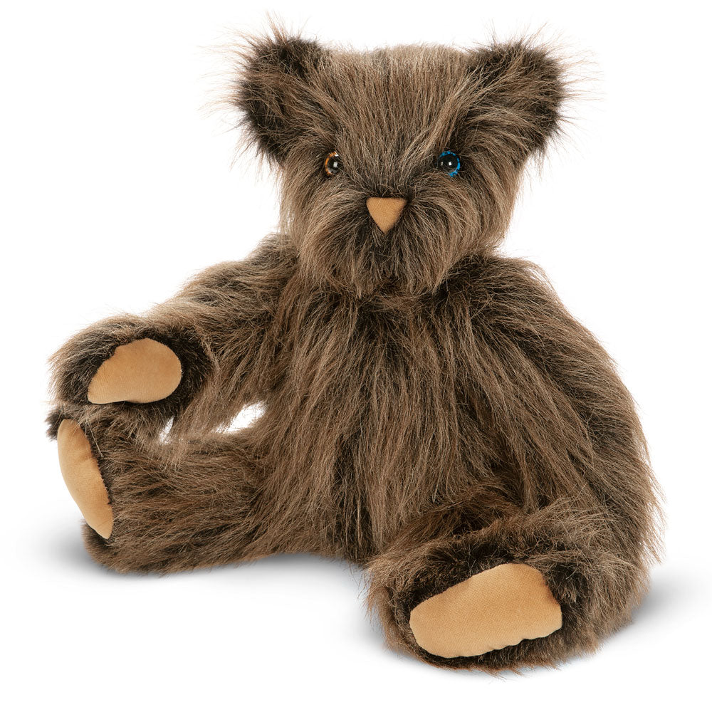 Plush 20-inch caramel brown teddy bear with long fur and tan paw pads sitting upright.