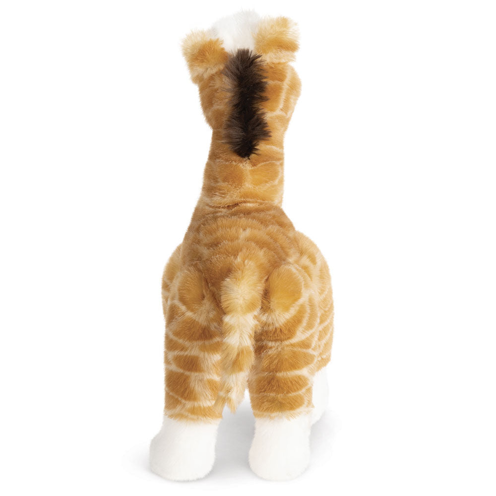 Plush giraffe toy with light brown and cream spots, white feet, and dark brown mane viewed from behind.