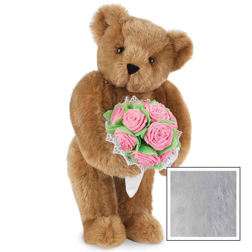 Brown teddy bear holding a bouquet of pink rose-shaped teddy bears with green leaves and lace trim.