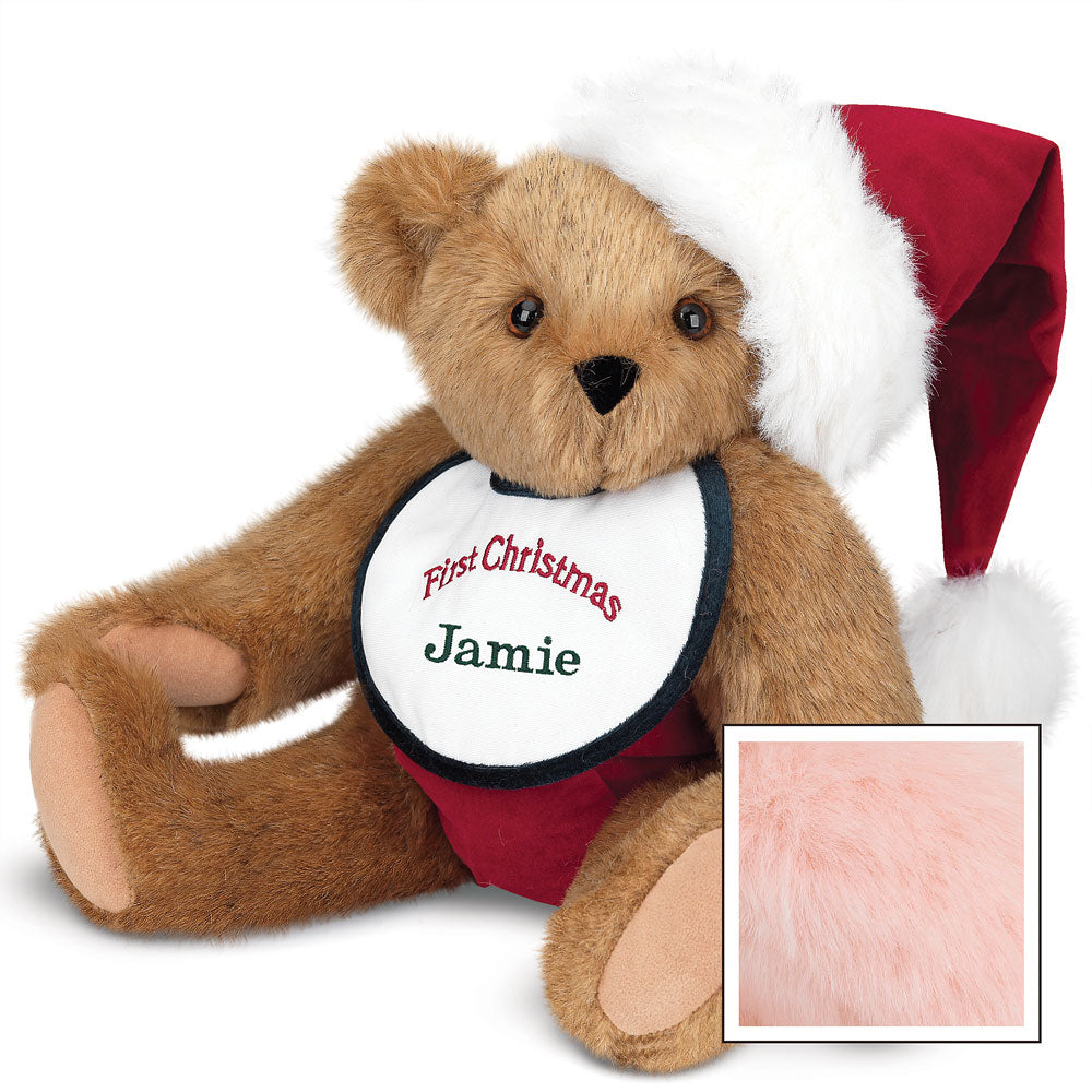 Honey brown teddy bear wearing a red and white Santa hat and personalized "First Christmas Jamie" bib.