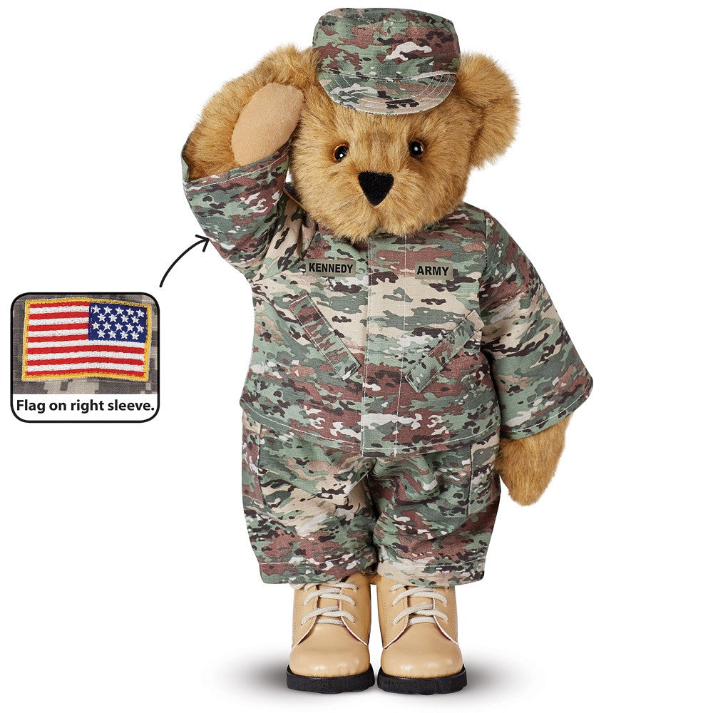 15-inch plush bear in camouflage military uniform with matching cap and tan boots, American flag patch on right sleeve.