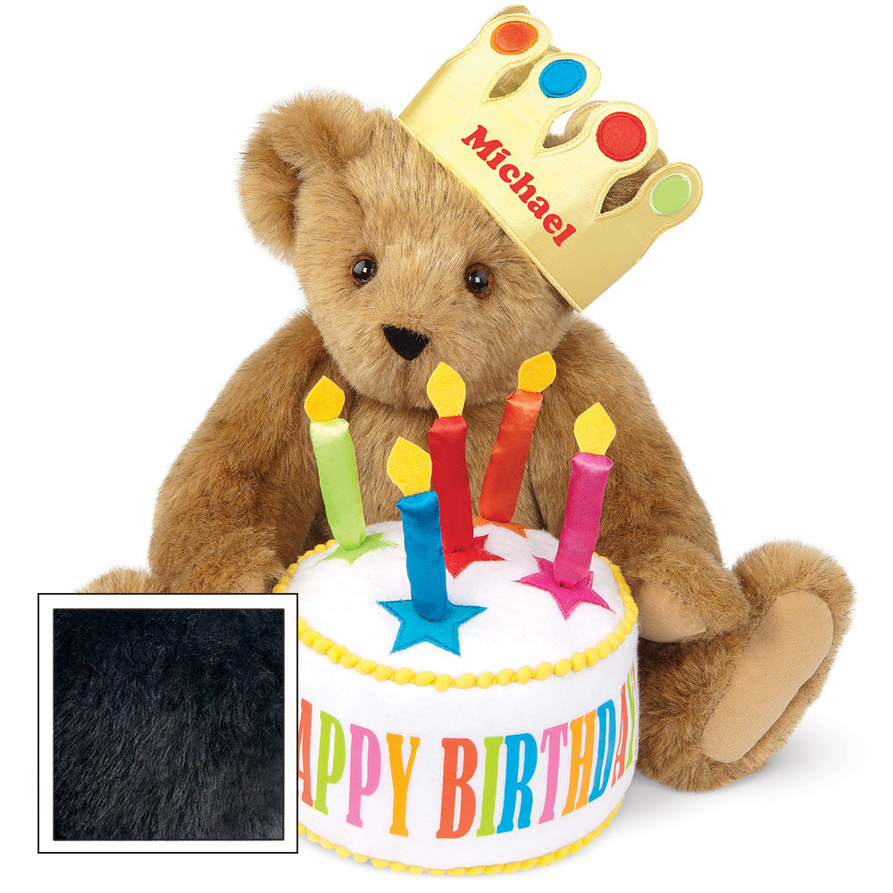 Honey brown teddy bear wearing a birthday crown with "Michael" and colorful birthday cake with candles and star topper.