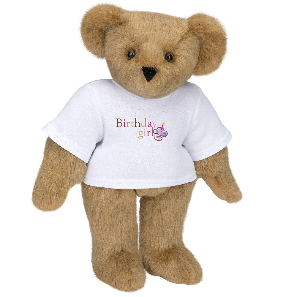Brown plush teddy bear wearing a white t-shirt with “Birthday girl” text and a pink cupcake design.