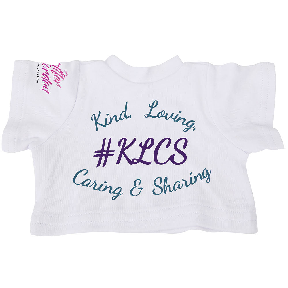 White toddler t-shirt with #KLCS and "Kind, Loving, Caring & Sharing" text in blue and purple, pink text on sleeve.