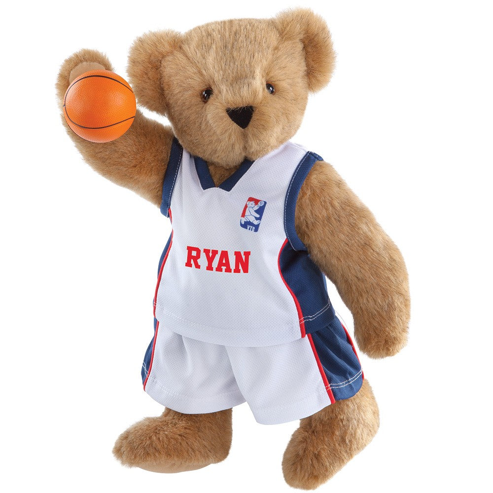 Brown teddy bear wearing white basketball jersey and shorts holding an orange basketball.