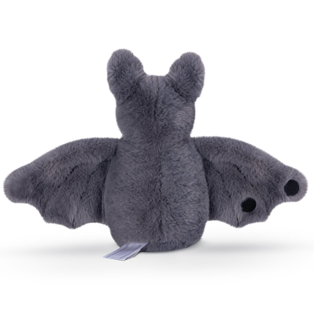 Plush gray bat toy with outstretched wings and black eyes on wing tips.