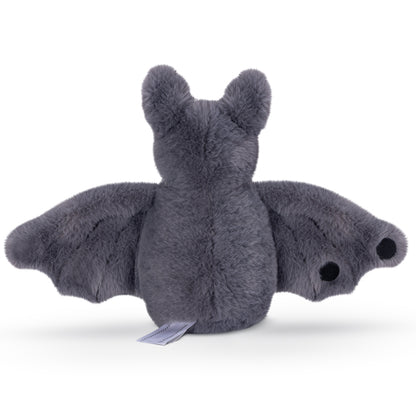 Plush gray bat toy with outstretched wings and black eyes on wing tips.