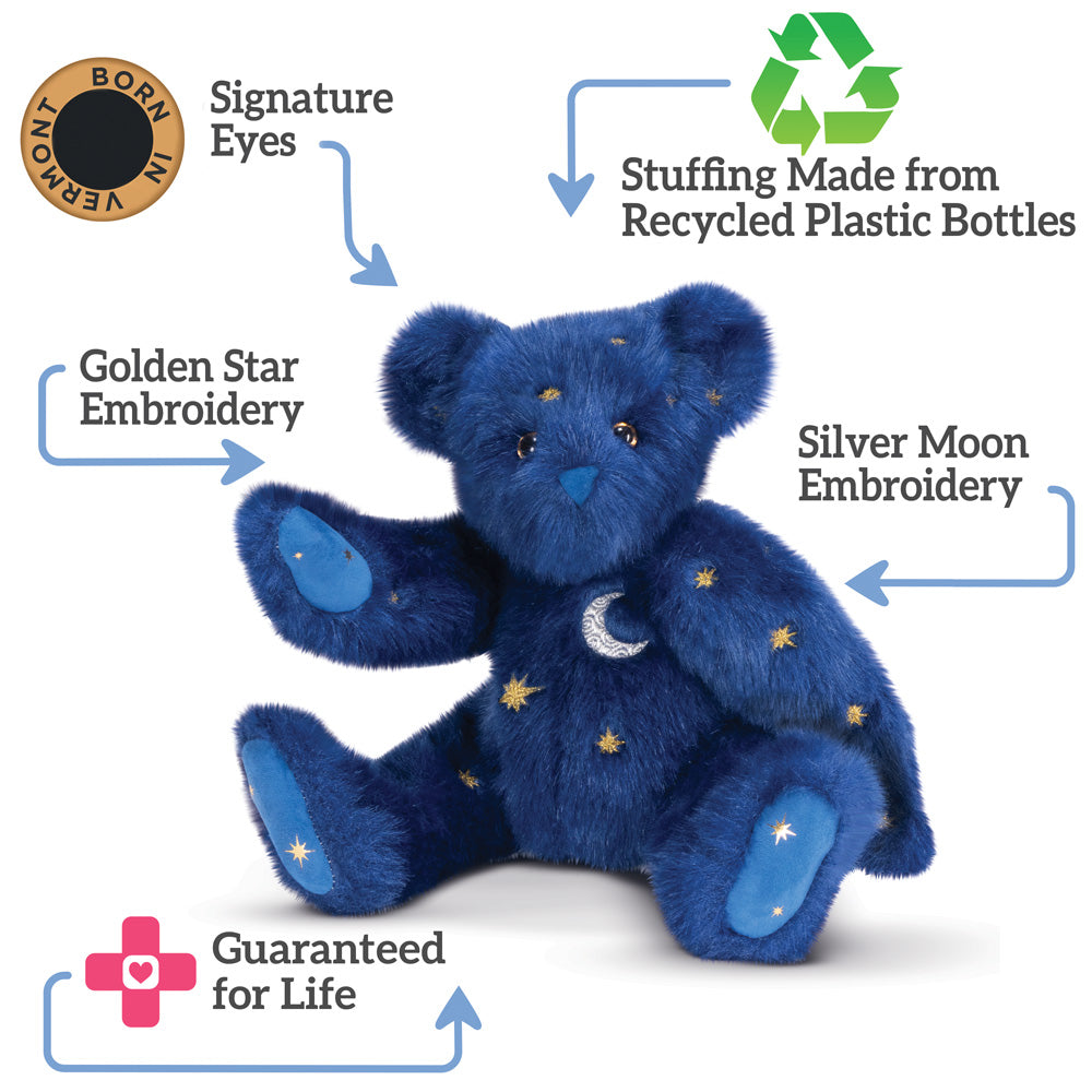 Plush dark blue bear with golden star and silver moon embroidery, blue paw pads, and recycled stuffing.