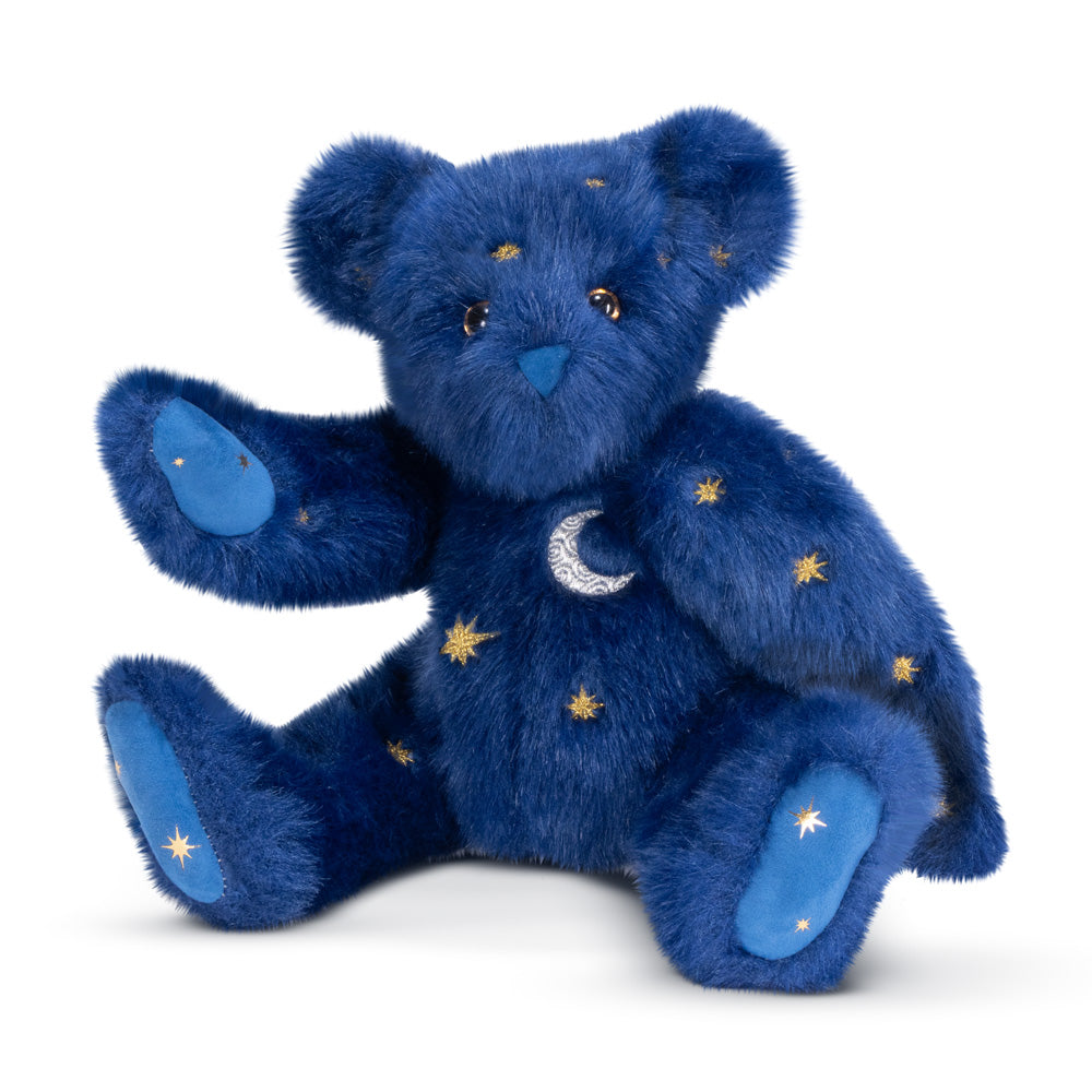 15-inch plush bear in dark blue fur with embroidered stars and crescent moon accents.