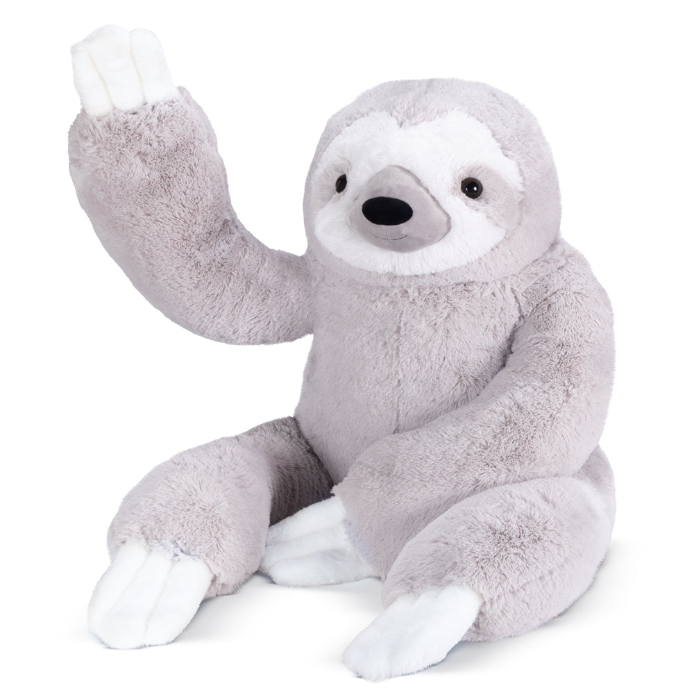 Plush toy sloth on a white background
