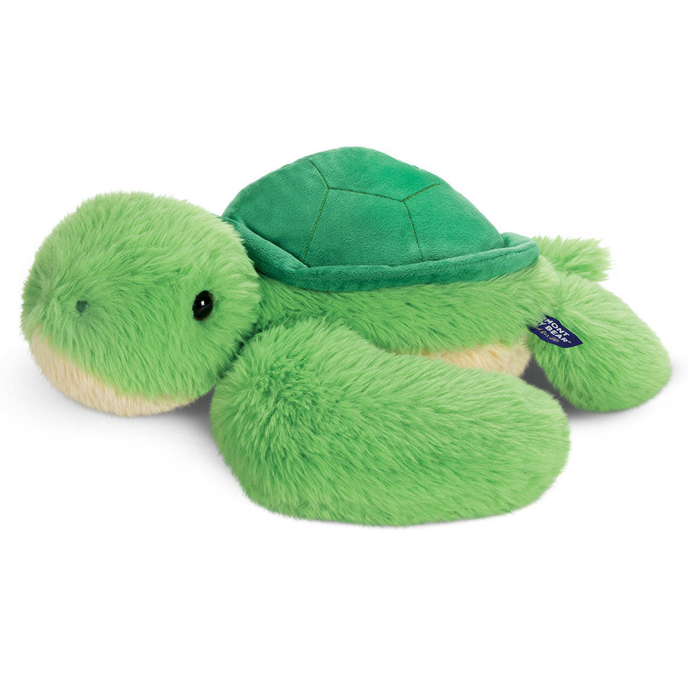 Soft plush green turtle with dark green shell and black eyes, lying flat on its belly.