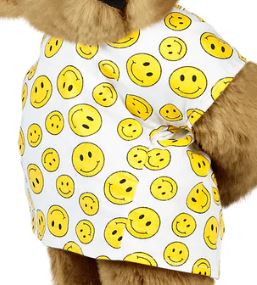 White pet shirt with multiple yellow smiley faces and a "get well" theme.