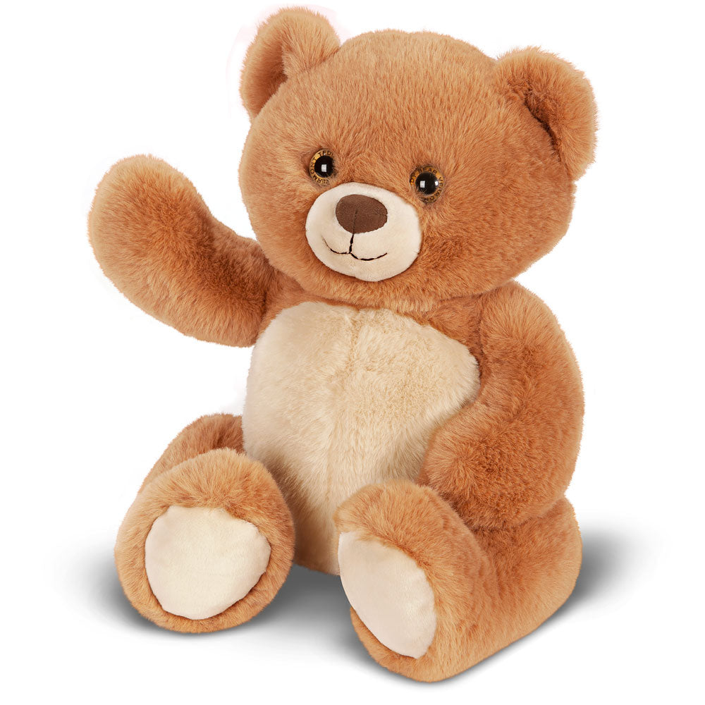 Honey-colored teddy bear with soft plush fur, light beige belly, and friendly face sitting upright with one paw raised.