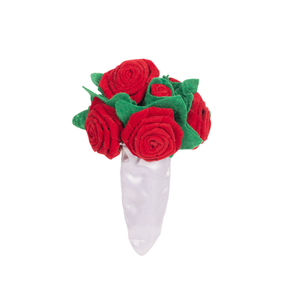 Medium bouquet of red velvet roses with green felt leaves wrapped in white satin ribbon.