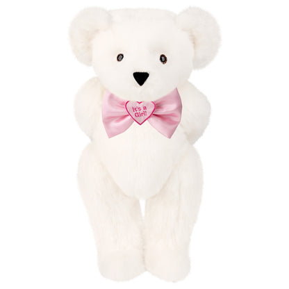 Cream-colored plush bear with pink satin bow tie and heart-shaped "It's a Girl!" pendant.