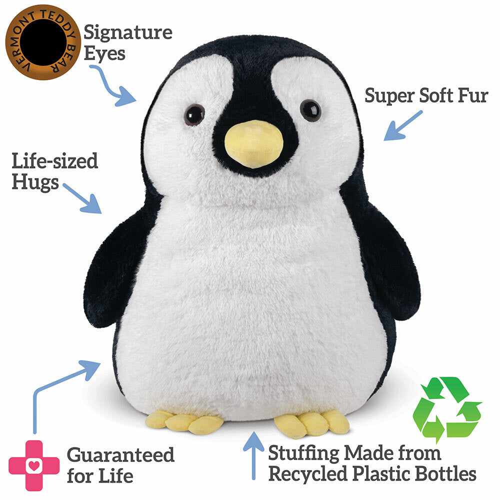 Plush penguin toy with features highlighted on a white background