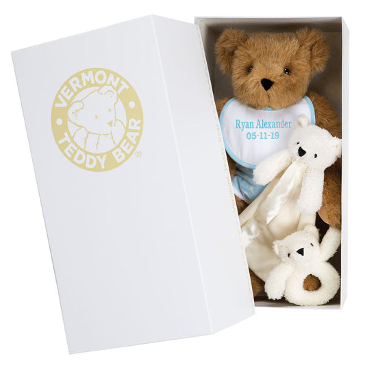 White rectangular box with Vermont Teddy Bear logo containing a 15-inch brown teddy bear and two small white plush bears.